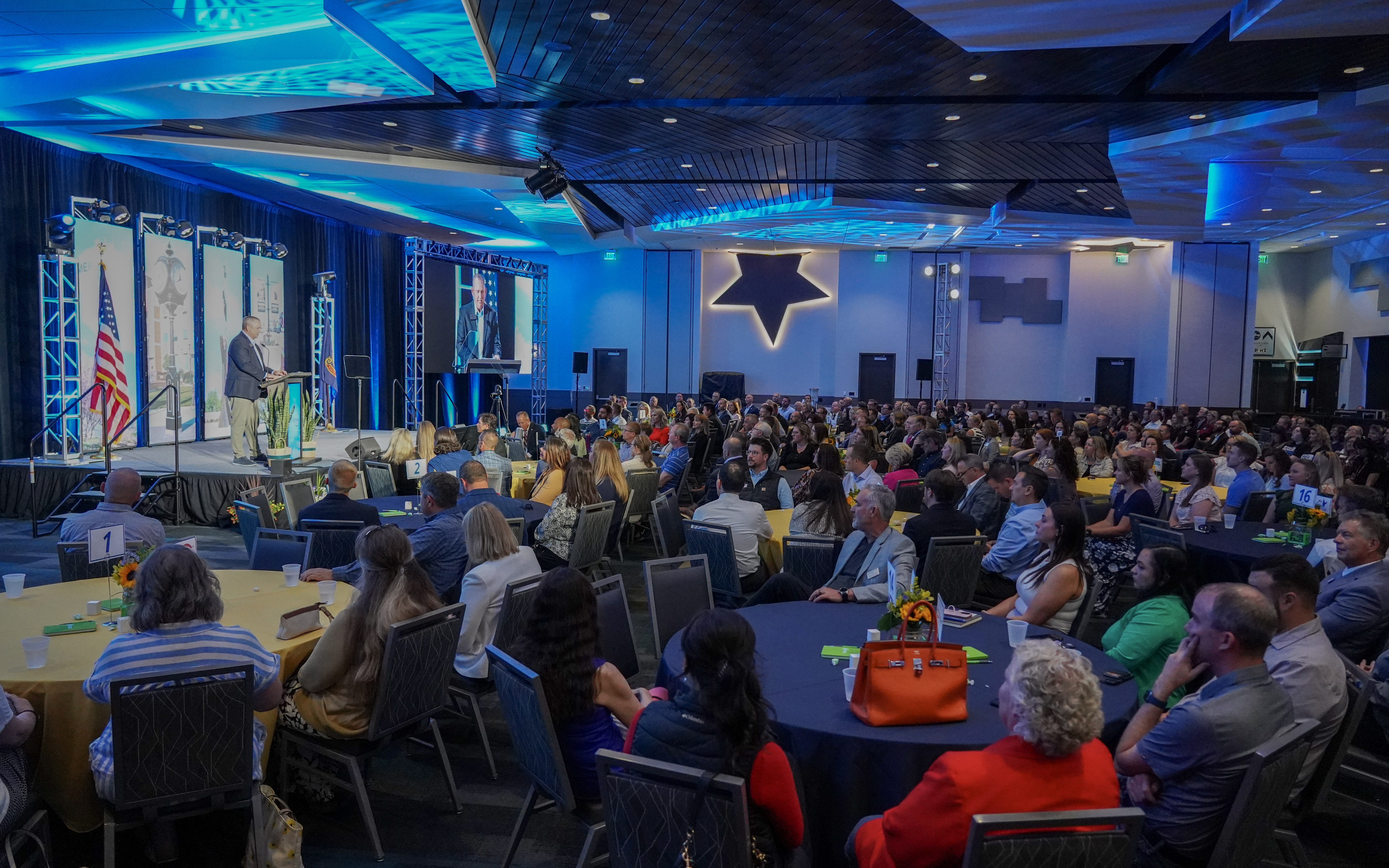 Full room at Galaxy Event Center listening to Mayor Simison give State of the City